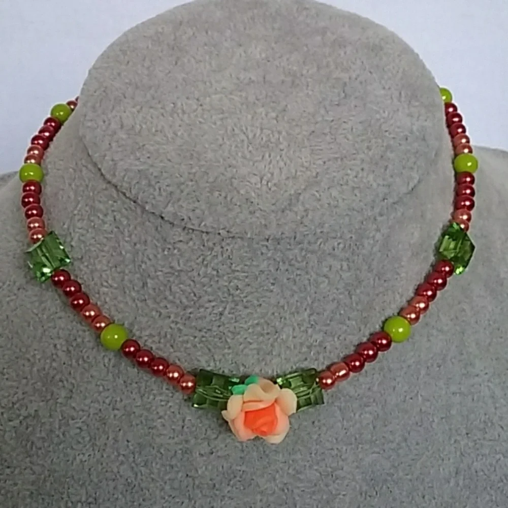 Girls beaded necklace with flower charm